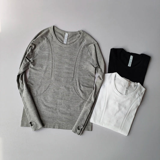 Vêtements de yoga, hauts de sport pour femmes, col rond, manches longues, sans coutures, amincissants, respirants, pour la course et le fitness. Séchage rapide.